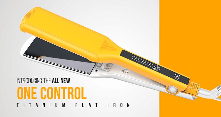 One Control Titanium Flat Iron photographed with its single control button on the handle
