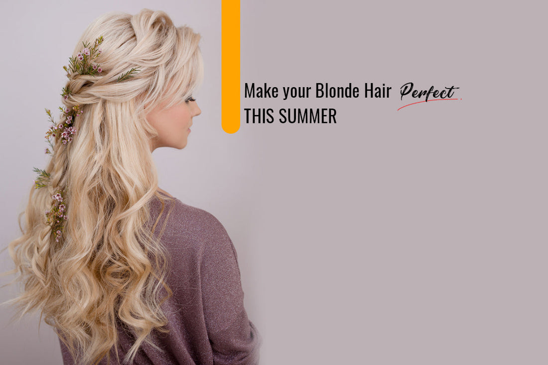 Woman with long platinum blonde hair standing outdoors in bright summer sunlight