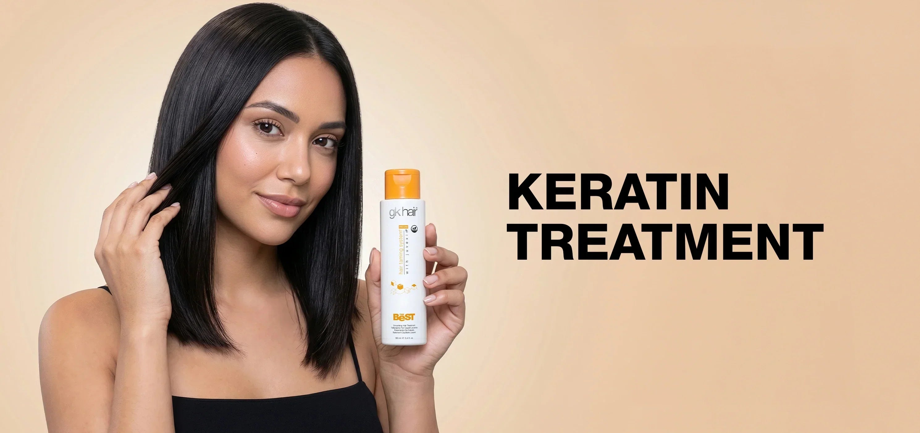 Stylist applying a keratin treatment to long hair, showing smooth, frizz-free results