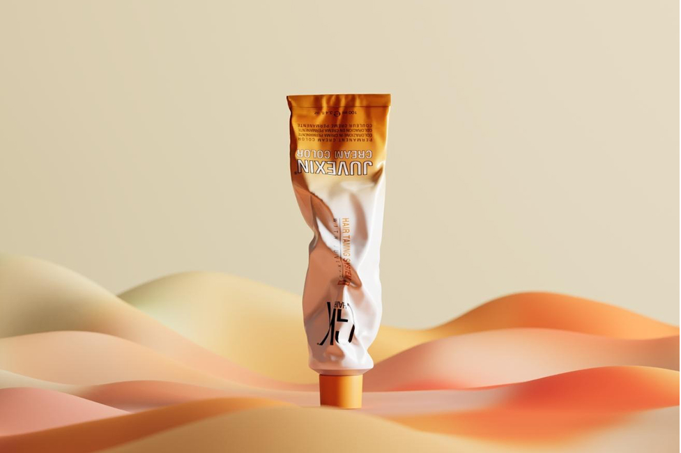 GK Hair Juvexin Cream Color tubes displayed alongside a chart of new hair color shades