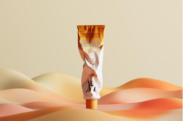 GK Hair Juvexin Cream Color tubes displayed alongside a chart of new hair color shades