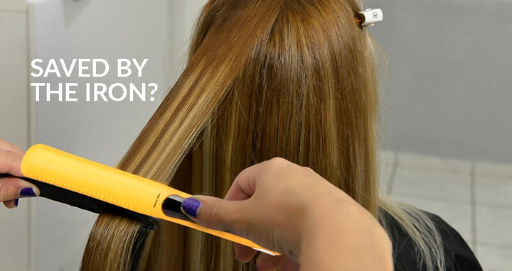 A lady using the best titanium flat iron