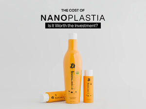 Salon stylist smoothing a client's hair during a nanoplastia straightening treatment