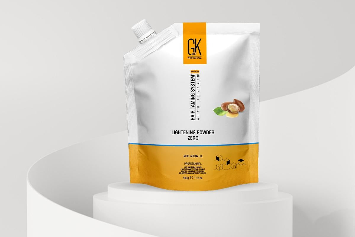 GK Hair Lightening Powder Zero packaging shown with argan oil and a bowl of lightener