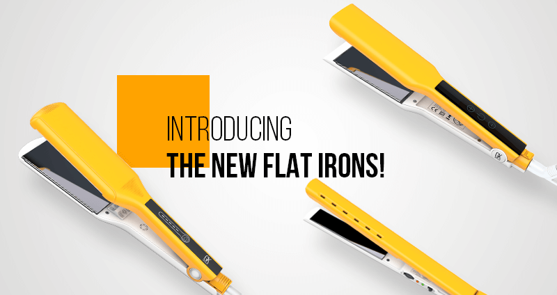 Three yellow and white GK Hair professional flat irons arranged diagonally on a light gray background
