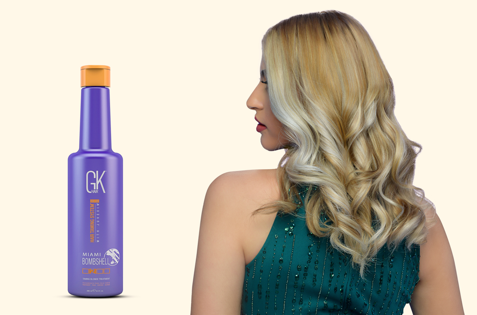 A lady with ash blonde hair after using GK Hair purple shampoo