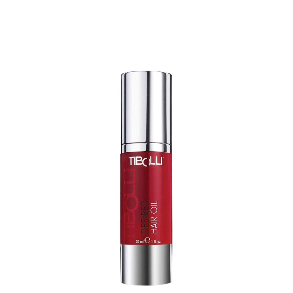 Tibolli Desired Hair Oil in a red pump bottle with a silver cap, labeled 30 ml / 1 fl. oz., front view on white