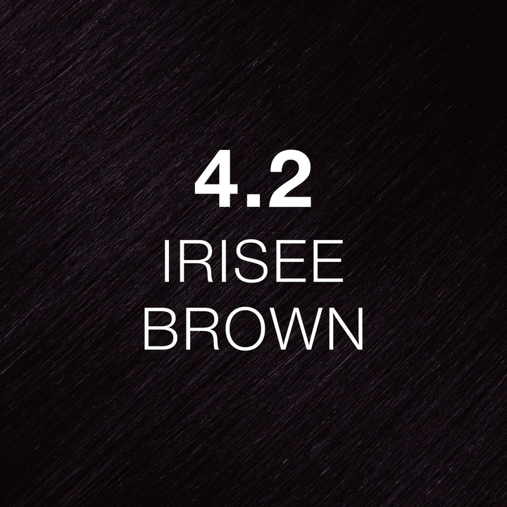 Very dark violet-toned brown hair texture printed with 4.2 Irisee Brown in white, a GK Hair Juvexin Cream Color swatch