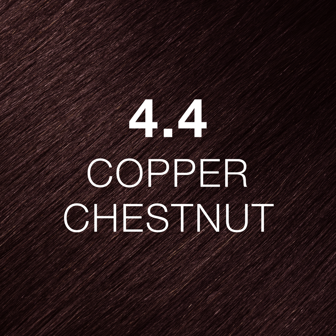 GK Hair Juvexin Cream Color 4.4 Copper Chestnut swatch: deep reddish copper-brown hair texture, shade name in white
