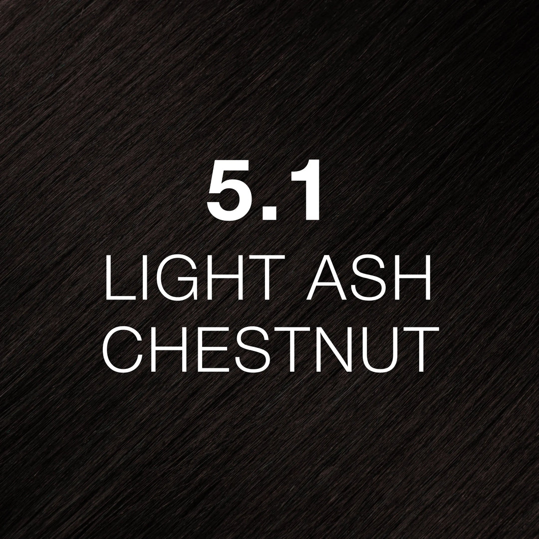GK Hair Juvexin Cream Color 5.1 Light Ash Chestnut hair color swatch, near-black brown hair texture, name in white