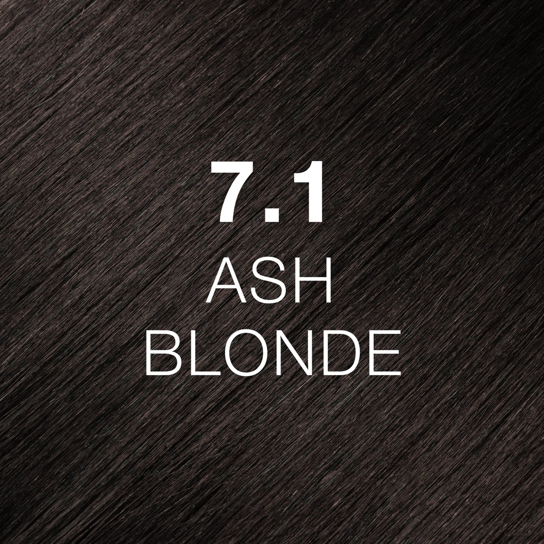 GK Hair Juvexin Cream Color 7.1 Ash Blonde hair swatch, near-black ashy brown strands, code and name printed in white