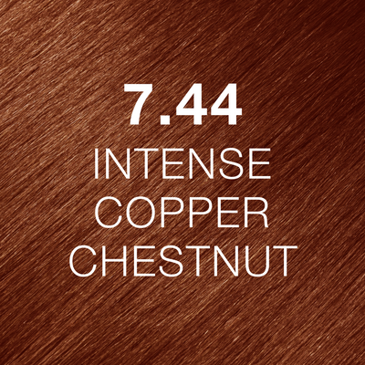 Silky hair texture showcasing the GK Hair's Juxevin Cream Color "7.44 Intense Copper Chestnut" in bold white text.