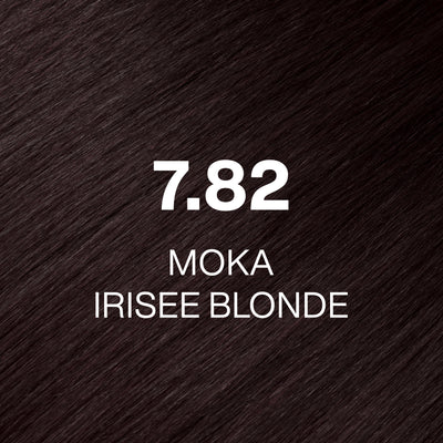 Silky hair texture showcasing the GK Hair's Juxevin Cream Color "7.82 Moka Irisee Blonde" in bold white text.