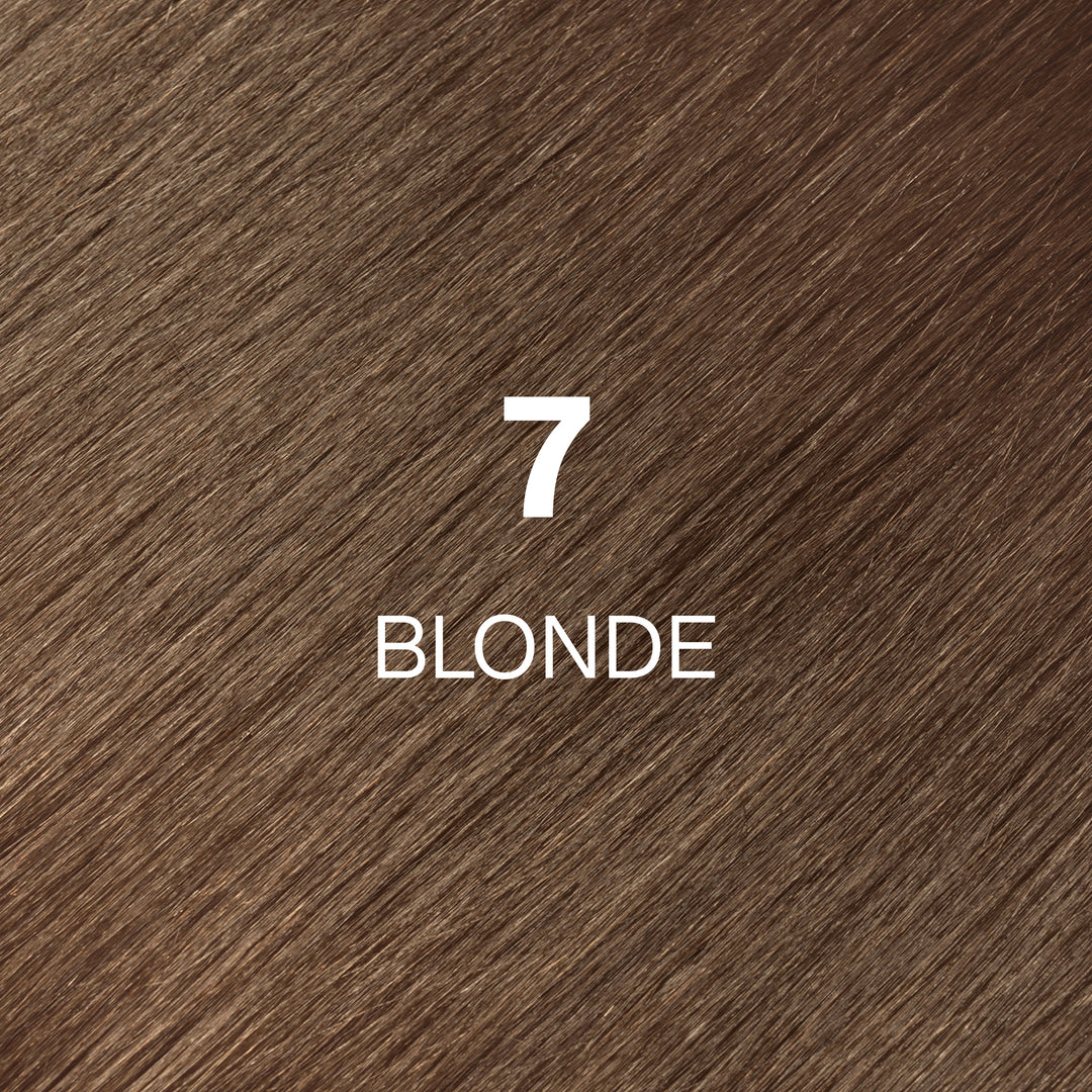 GK Hair Juvexin Cream Color swatch 7 Blonde, medium warm golden-brown hair texture with the shade name in white
