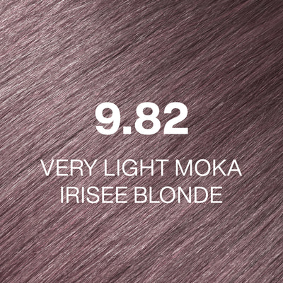 Silky hair texture showcasing the GK Hair's Juxevin Cream Color "9.82 Very Light Moka Irisee Blonde" in bold white text.