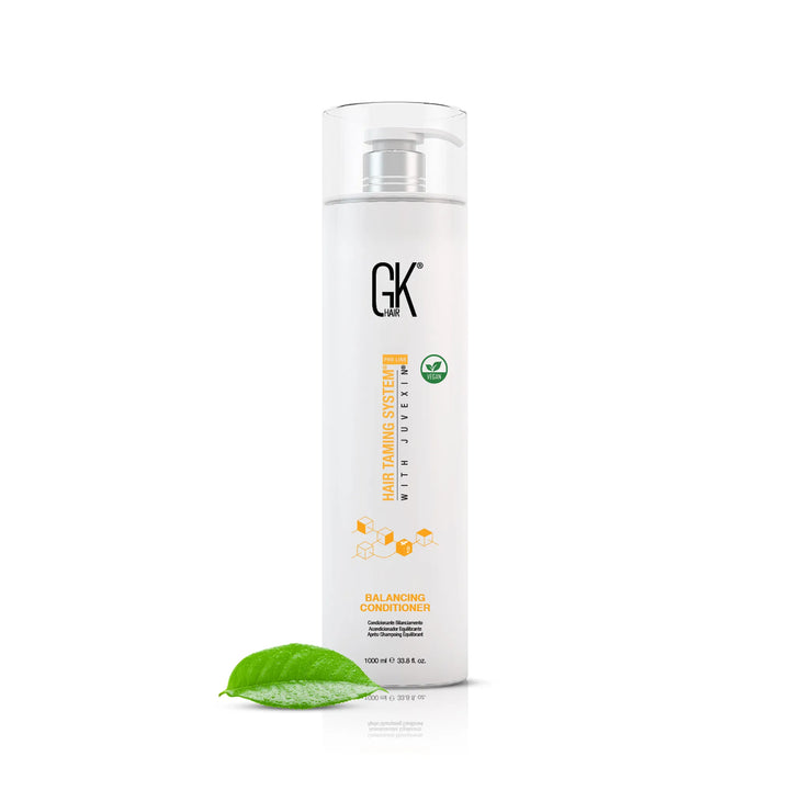 GK Hair Balancing Conditioner  1000 ml, with a green leaf in the foreground.