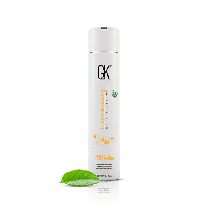 GK Hair Balancing Conditioner 300 ml, with a green leaf in the foreground.