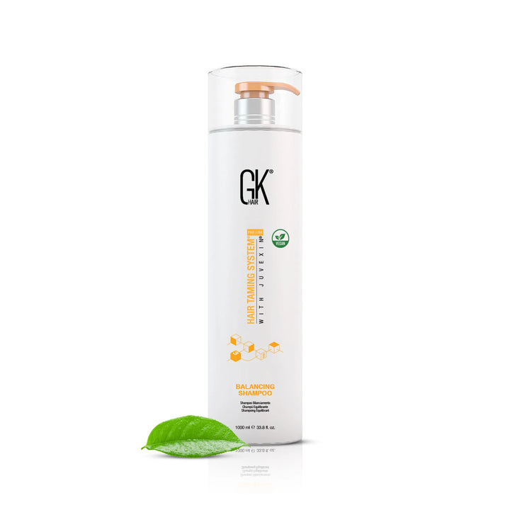 GK Hair Balancing Shampoo 1000 ml, with a green leaf in the foreground.