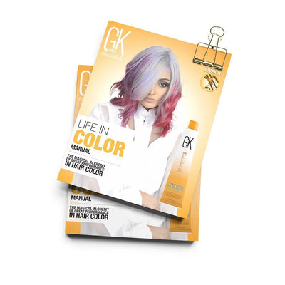 A professional hair color manual titled "Life in Color" by GK Hair, featuring vibrant hair color and a stylized tube of hair product.