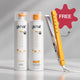 Two gk hair 'hair family system' bottles with orange caps are shown next to a yellow and silver hair straightener, with a pink starburst graphic reading 'FREE' in the upper right corner.