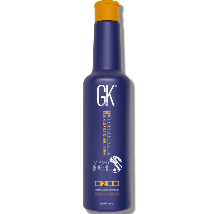 Purple bottle of GK Hair Miami Bombshell Shampoo with a yellow cap with white background.