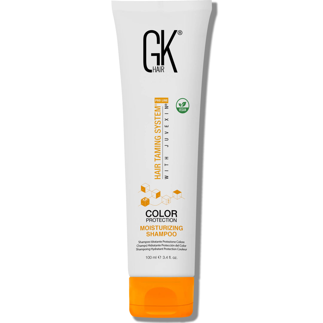 GK Hair Color Protection Moisturizing Shampoo 100 ml white tube with an orange cap and a green vegan badge