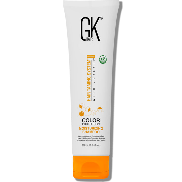 GK Hair Color Protection Moisturizing Shampoo 100 ml white tube with an orange cap and a green vegan badge