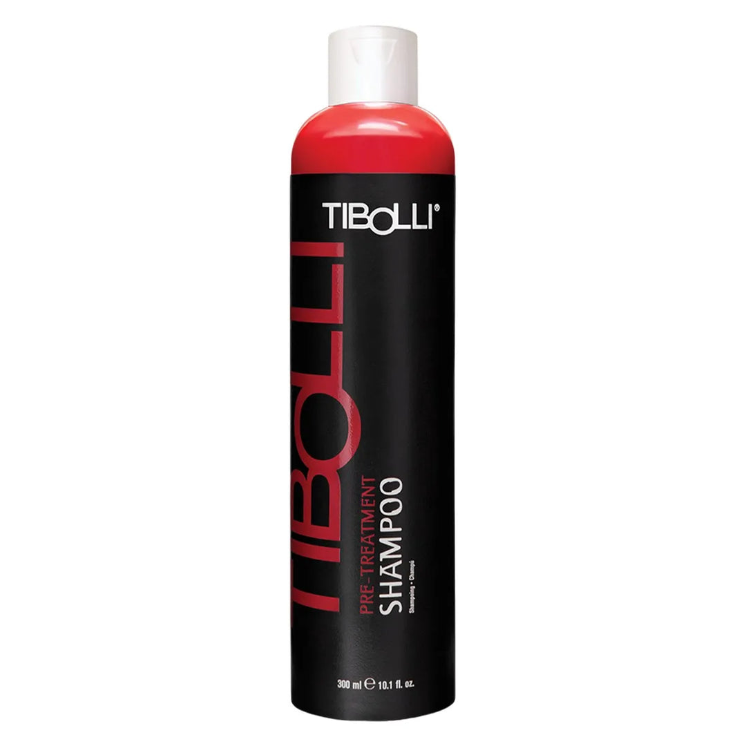 Tibolli Pre-Treatment Shampoo 300 ml / 10.1 fl oz black bottle of red liquid with a white cap, front view on white