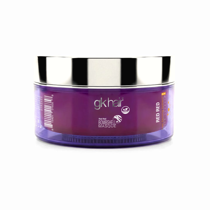 Purple hair mask jar with silver lid on a white background