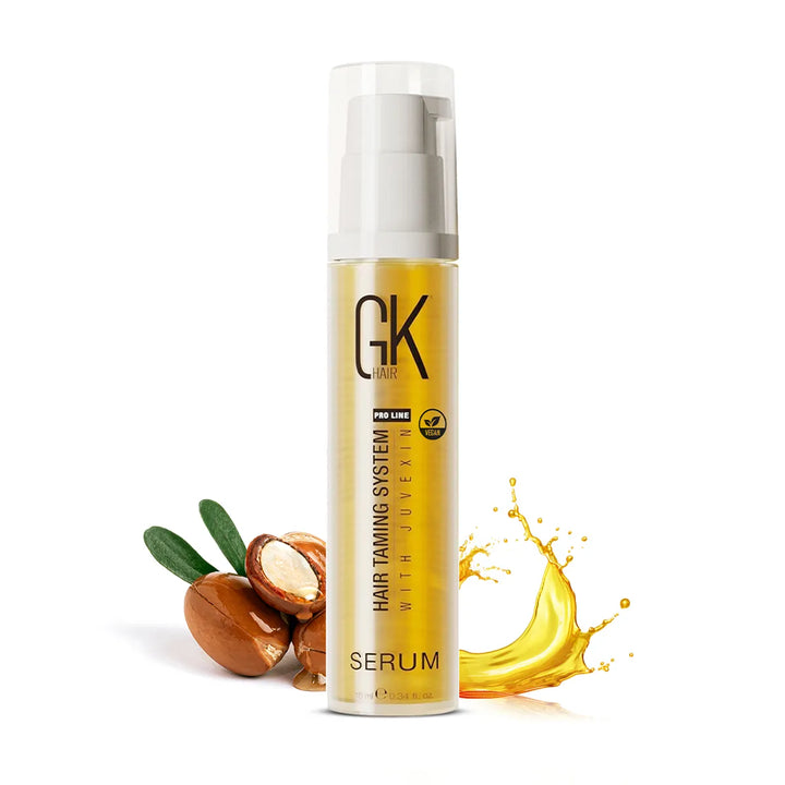 GK Hair Serum in a 10 ml / 0.34 fl. oz. pump bottle with Pro Line and Vegan badges, argan nuts and an oil splash beside it