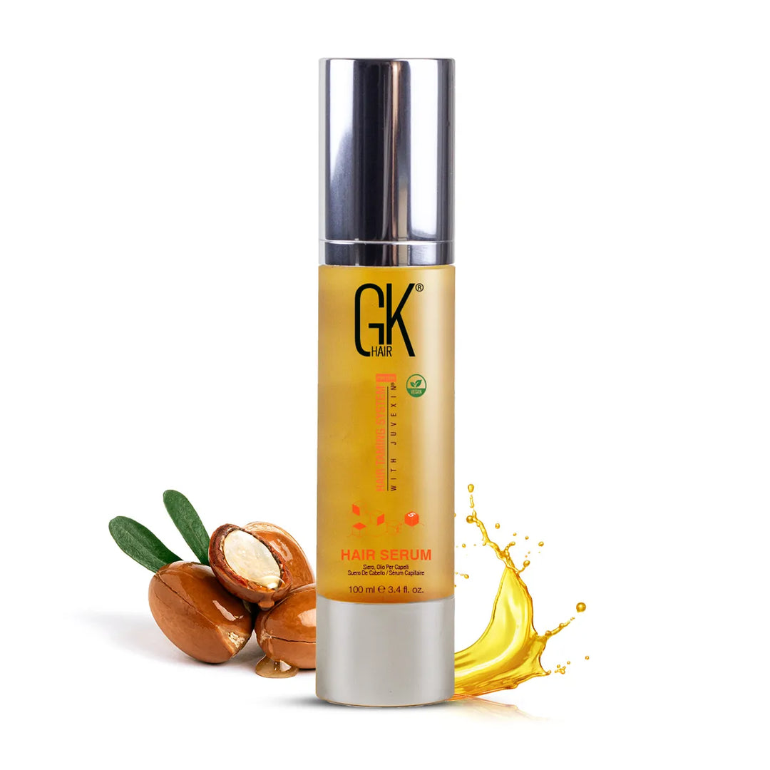 Salon-quality organic argan oil serum for smooth hair texture in a white background