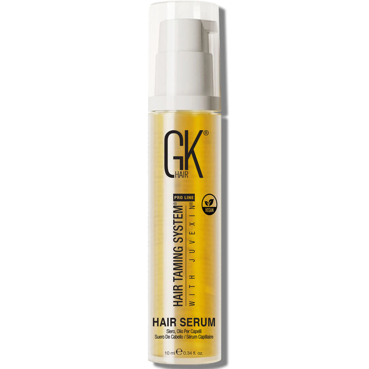 GK Hair Hair Serum 10 ml, clear pump bottle of golden yellow serum with a green vegan badge, front view on white