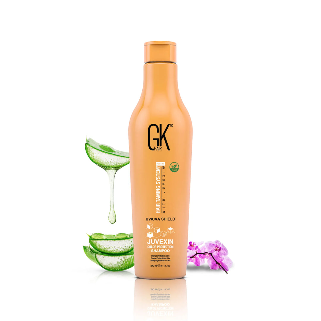 GK Hair UV/UVA Shield Juvexin Color Protection Shampoo 240 ml orange bottle with a flip cap, aloe vera slices and a pink orchid