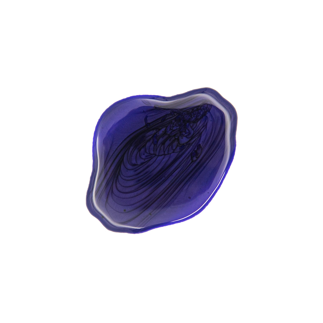A Swirl of GK Hair Silver Shampoo with a white background