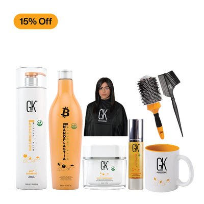 Collection of GK hair care products including bottles, a mug, and brushes on a white background with a 15% off label.