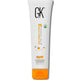 GK Hair product tube with white and orange design on a white background