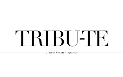 Press logo for TRIBU-TE, the hyphenated serif wordmark over a rule reading Hair & Beauty Magazine, black on white