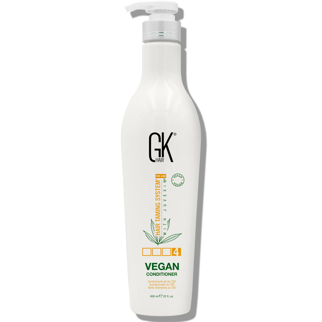 GK Hair Vegan Shampoo 650ml featuring a pump dispenser and branding, labeled as part of the Hair Taming System.