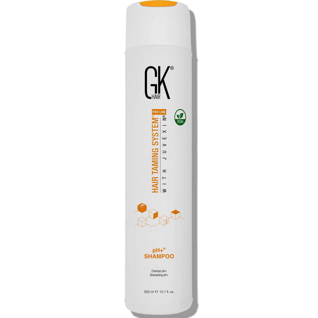 GK Hair pH+ Shampoo 300 ml white bottle with an orange flip cap and a green vegan badge on a white background